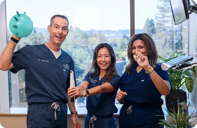 The doctors smiling and laughing