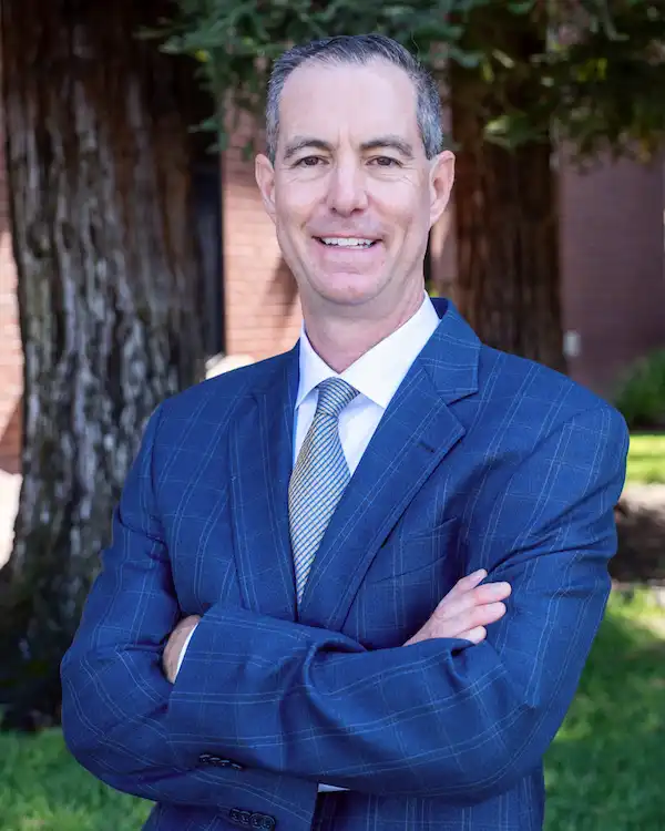 Dr. Scott Keith Smiling outside of Dental Implant Center at Walnut Creek