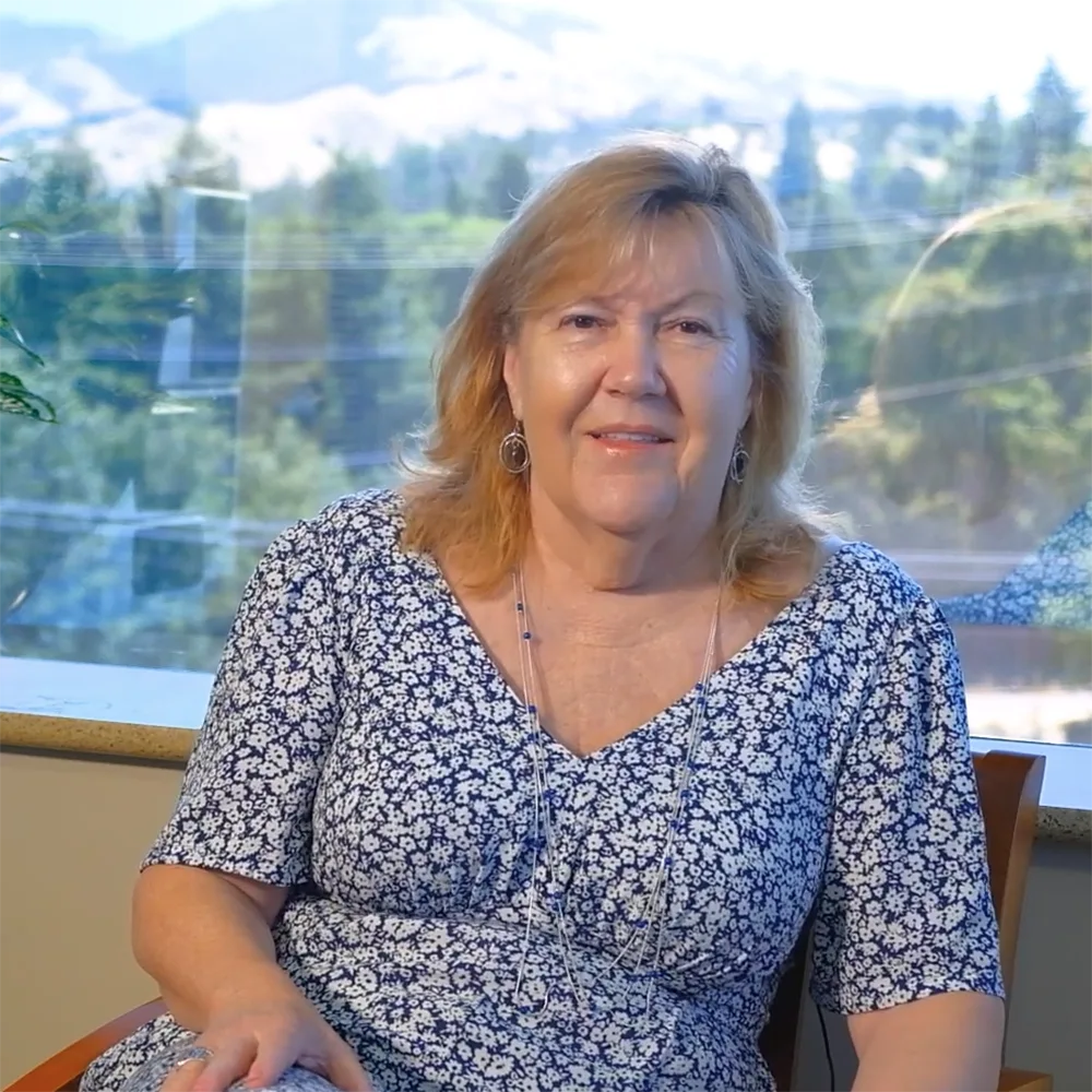Pam delivering a review for the Dental Implant Center at Walnut Creek