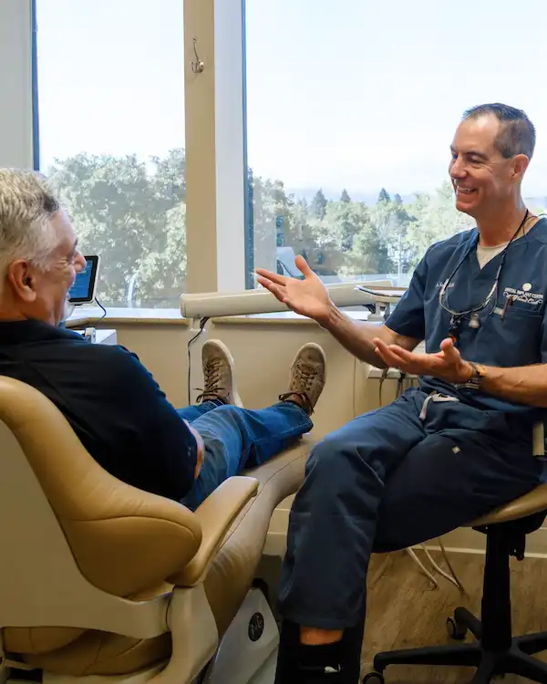 Doctor talking about services with patient