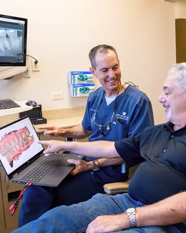 Dr. Keith with a patient at Dental Implant Center at Walnut Creek in Walnut Creek, CA