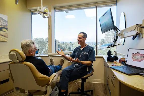 Dr. Keith with a patient during his emergency visit.