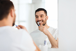Brushing Teeth As a Caregiver Means Needing to Watch for Signs of Trouble